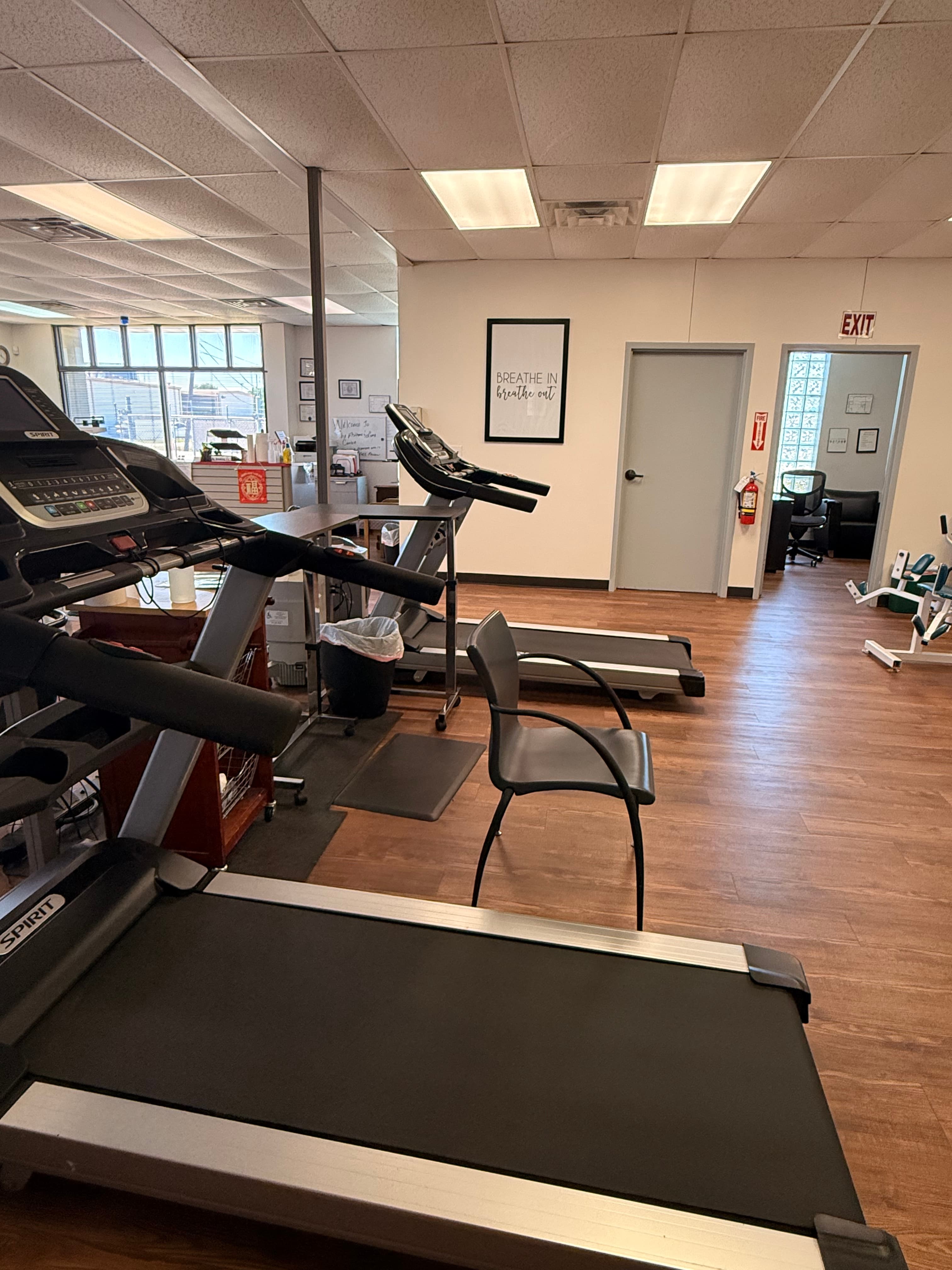 Patient using pulmonary rehabilitation equipment
